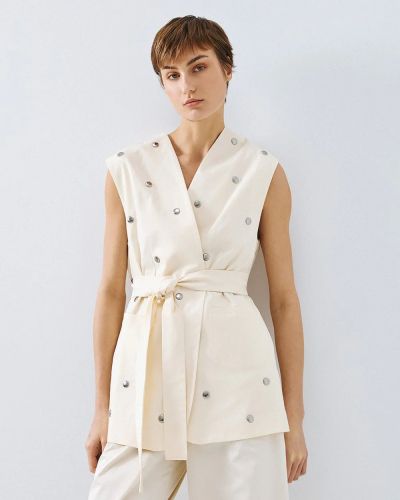 Oversized vest with eyelets - a modern and stylish choice ACCESS FASHION (SKU) 1015