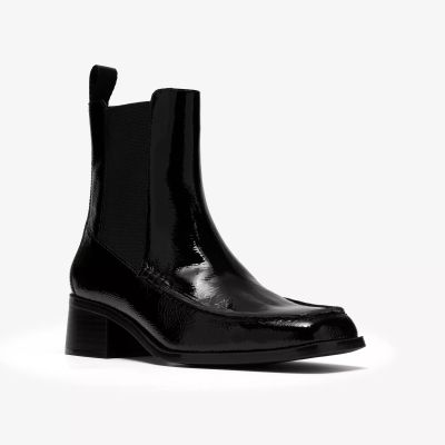 Women's black patent leather ankle boot with a mid-heel. An elegant and comfortable style. CLARKS (SKU) 26320247