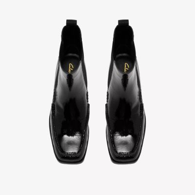 Women's black patent leather ankle boot with a mid-heel. An elegant and comfortable style. CLARKS (SKU) 26320247